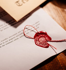 An estate planning will with a wax stamp on it.